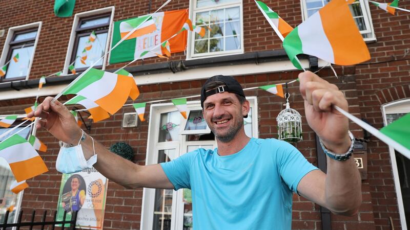 Local man Alan O’Keeffe who organised the bunting. ‘I just went around the doors two days ago and asked everyone did they want to get bunting and they all chipped in.’ Photograph: Nick Bradshaw