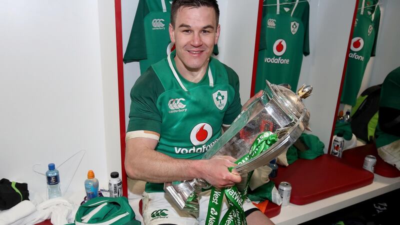 Jonathan Sexton with the NatWest Six Nations trophy after Ireland’s Grand Slam win against England at Twickenham. Photograph: Dan Sheridan/Inpho