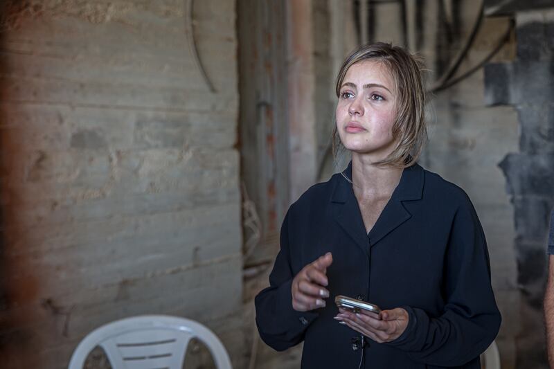 Diana, a cousin of Sayfollah Musallet, reads a family statement the day after his death. Photograph: Sally Hayden
