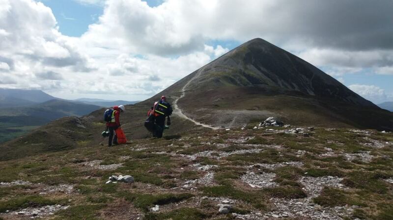 Mayo Mountain Rescue said it had treated a number of individuals, including a 71-year-old woman who was dehydrated, a 46-year-old man evacuated by Air Corps helicopter to hospital for chest pain and a 54-year-old man with an ankle injury. Photograph: Mayo Mountain Rescue/Twitter