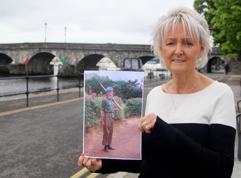 Bernadette Quinlan with a photograph of her late brother, Matt, in Carrick-on-Shannon, Co Leitrim