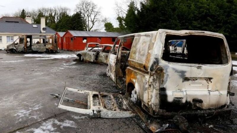 In the early hours of last Sunday a Roscommon property was stormed by a gang who beat security men guarding the premises, burning their vans and cars and forcing them out of the house. Photograph: Brian Farrell