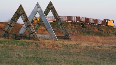 Lough Boora Discovery Park: Art on the bogs: 60 Degrees by Kevin O’Dwyer (foreground); Sky Train by Michael Bulfin. Photograph: Tom Egan/Lough Boora Discovery Park
