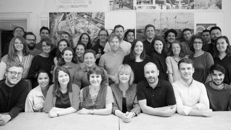 Yvonne Farrell and Shelly McNamara with the Grafton Architects staff. Photograph: Alice Clancy
