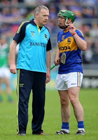 Eamon O'Shea with John O’Dwyer with Tipperary in 2014. Photograph: Cathal Noonan/Inpho