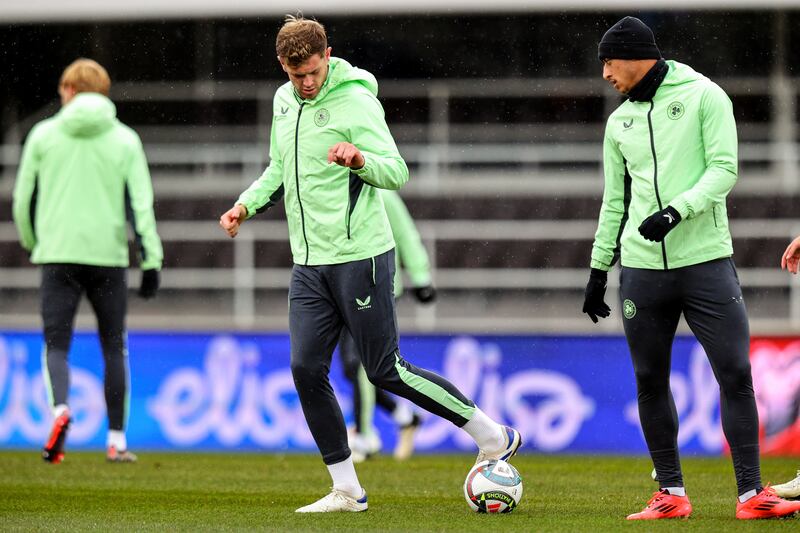 Nathan Collins and Adam Idah at Republic of Ireland squad training in Helsinki. Photograph: Ryan Byrne/Inpho