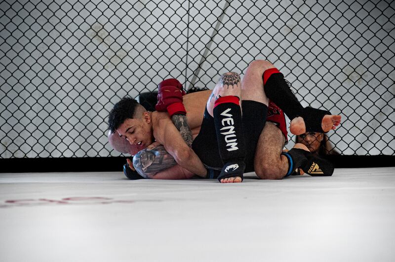 A grappling exchange between Dean Walsh and Jayden Murphy at Premier MMA in Kilkenny. Photograph: Megan Ponomarenko