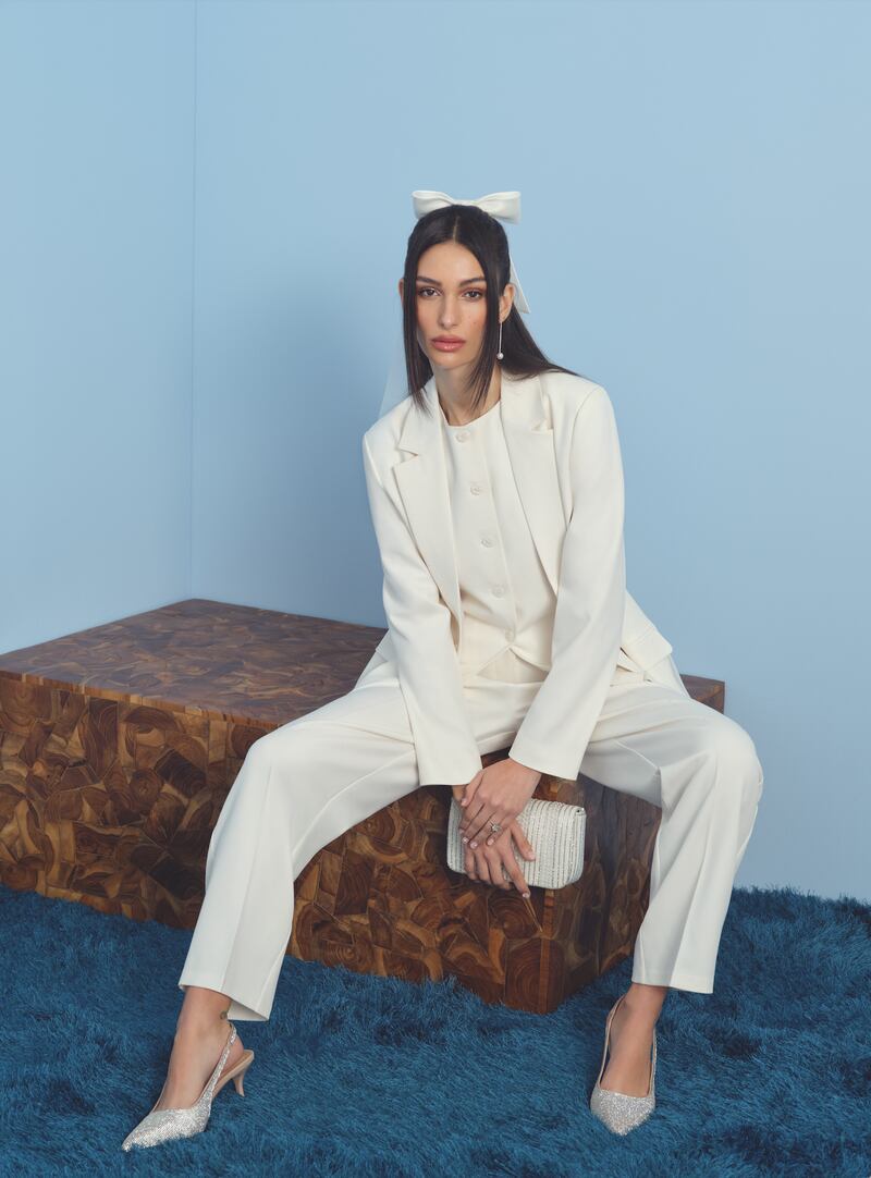 Veil, €7; bag, €14; blazer, €26; waistcoat, €18; trousers, €16; shoes, €17 - all Penneys