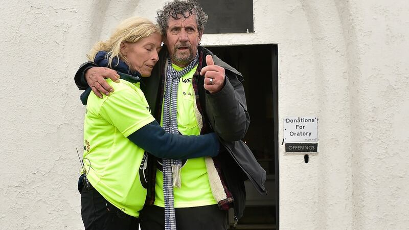 Claire Mould and Charlie Bird after reaching the summit of Croagh Patrick. Photograph: Conor McKeown