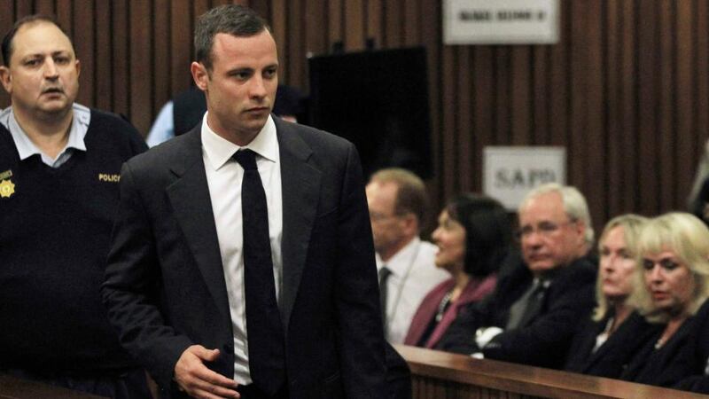 Oscar Pistorius arrives in court ahead of his trial at the North Gauteng High Court in Pretoria. Photograph: Themba Hadebe/Pool/Reuters