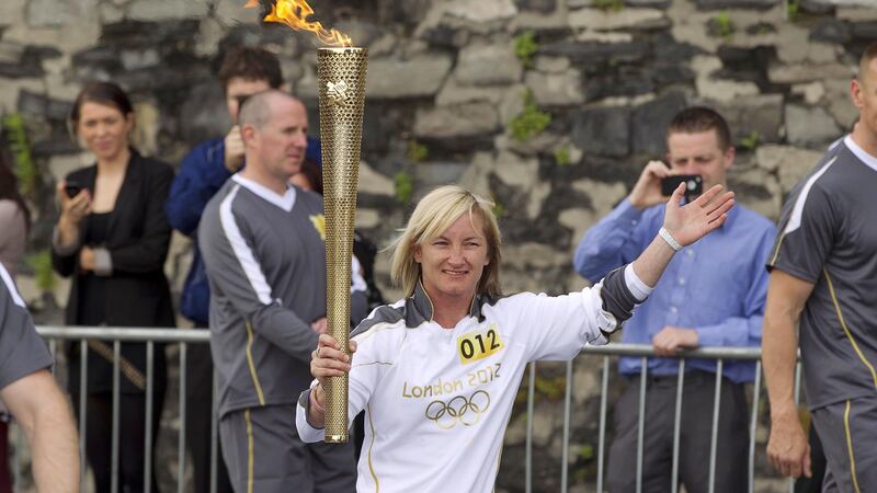 Olivia O’Toole carried the 2012 Olympic torch through her home patch
