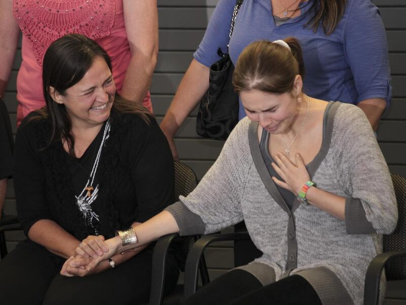 Amanda Knox with her mother, Edda Mellas, after returning to Seattle in 2011. Photograph: Michael Hanson/New York Times