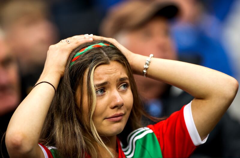A Mayo fan reacts as goalkeeper Rob Hennelly scores a point to put the sides equal and force the game into extra-time. Photograph: James Crombie/Inpho