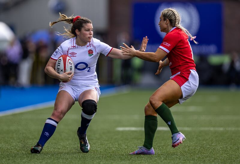 England's Jess Breach is tackled by Lowri Norkett of Wales at Cardiff Arms Park on Sunday. Photograph: Steven Paston/PA