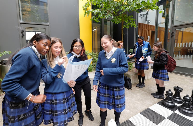 Ketsia Nganga, Lara Mason, Chalisa Clarke, and Noemi Singeorzan, from Kishogue Community College in Lucan, were among thousands sitting English paper one on Wednesday. Photograph: Alan Betson

