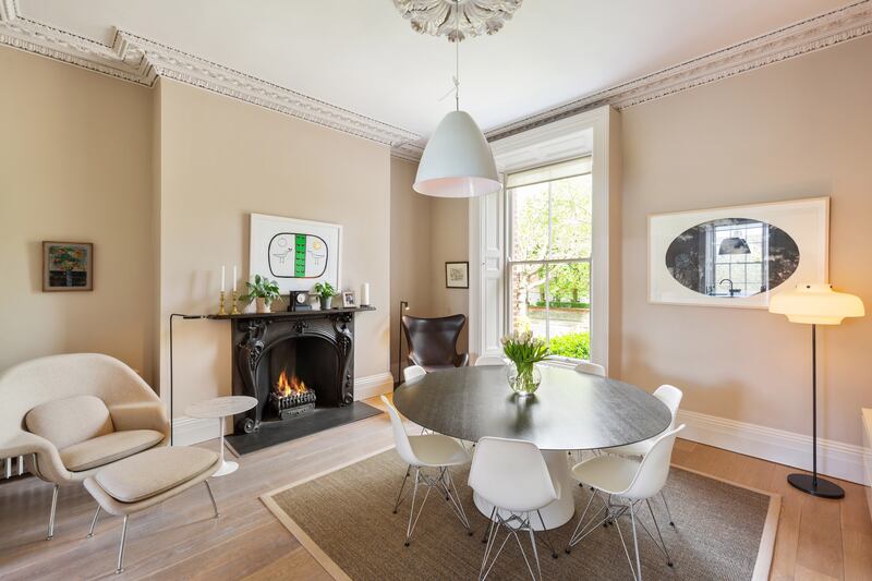 Diningroom with mid-century furnishing. Photograph: Angela Mujica