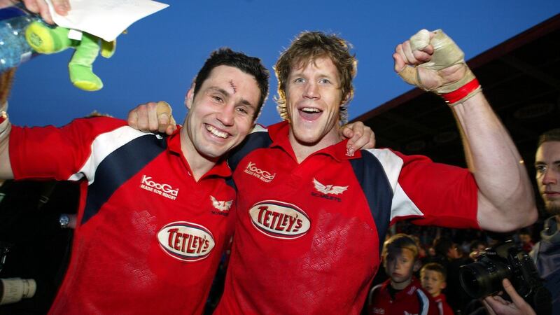 Stephen Jones and Simon Easterby celebrate a win for Llanelli in 2004. Photograph: Andrew Paton/Inpho