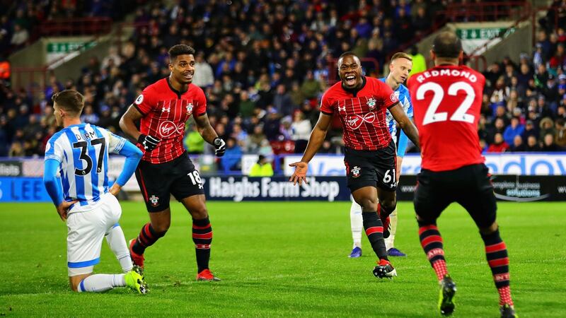 Michael Obafemi celebrates scoring his first Premier League goal agaisnt Huddersfield. Photograph: Chris Brunskill/Fantasista/Getty Images
