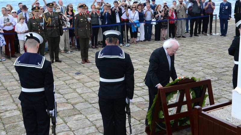 President Michael D Higgins laying a wreath on Howth Pier for the Asgard centenary celebrations. Photograph: Cyril Byrne