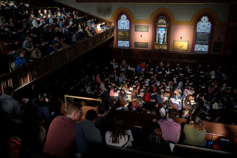 Students fill the seats of Battell Chapel for Laurie Santos’s Psychology and the Good Life class at Yale University in New Haven, Connecticut on January 25th, 2018. Photograph: Monica Jorge/The New York Times