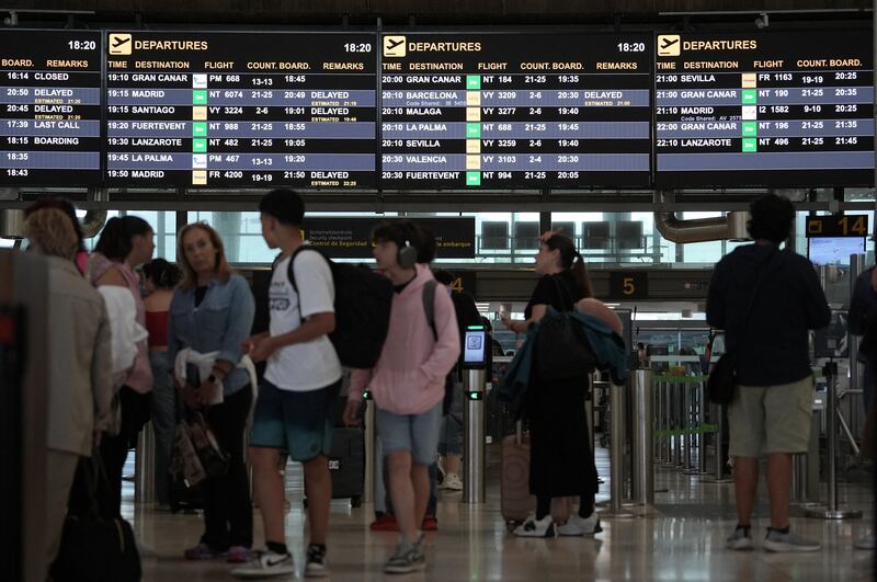 A screen of delayed flights at Tenerife North Airport on Monday. Photograph: Manaure Quintero/Getty   