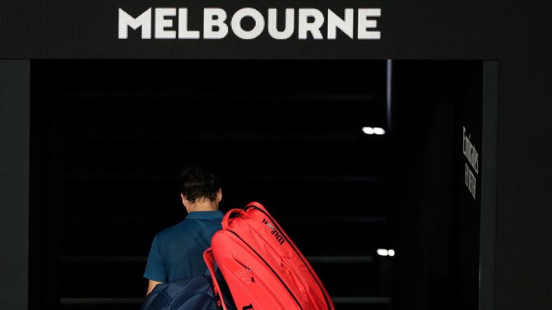 Roger Federer leaves the court after his defeat in Melbourne. Photograph: Lynn Bo Bo/EPA