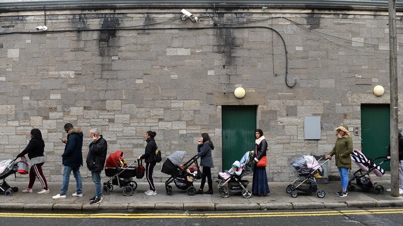 A queue forms outside the Capuchin Day Centre for family necessities on Monday morning. Photograph: Dara MacDónaill/The Irish Times