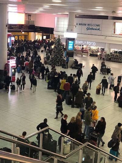 Queues of passengers in the check in area at Gatwick Airport on Thursday morning. Photograph: Thomas Hornall/PA