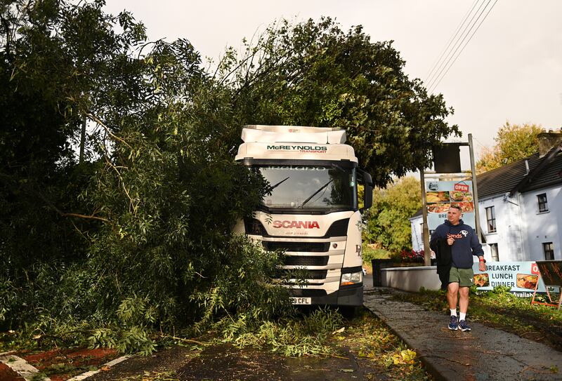 A lorry was stuck after being hit by a falling tree during Storm Amy on Saturday in Antrim. Photograph: Charles McQuillan/Getty 