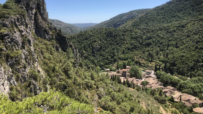Cycling through scented pinewoods, with stops for coffee and the occasional cold beer in the shady squares of tiny hill villages.