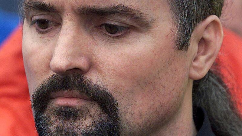 Loyalist paramilitary Michael Stone walking free from the Maze Prison on July 24th, 2000, under the prisoner release scheme. Stone was one of about 80 prisoners to be freed that week. Photograph: Paul McErlane/Reuters