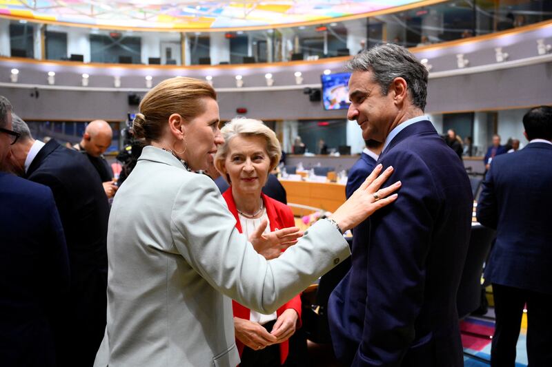 Denmark's prime minister Mette Frederiksen speaks with European Commission president Ursula von der Leyen and Greek prime minister Kyriakos Mitsotakis during a meeting at the European Council in Brussels on Thursday. Photograph: John Thys/AFP via Getty Images 