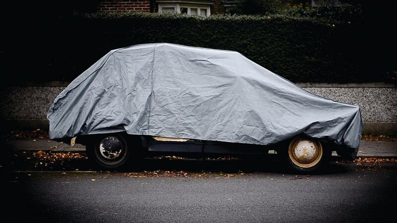Multimedia Award : Some owners of cars keep them under cover many reasons. In this video a number of people reveal what’s underneath the large tarpaulin in their front driveway and detail their relationships they have with their vehicles. Still from video by Bryan O’Brien / The Irish Times