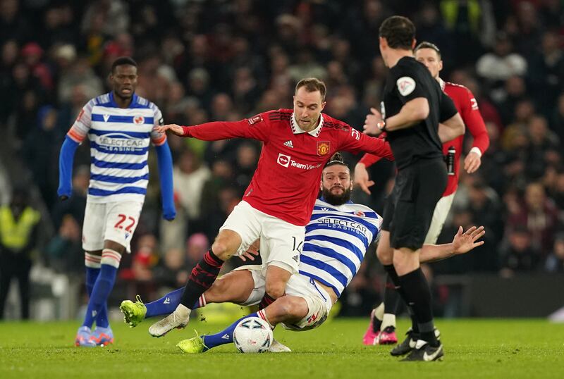 Reading's Andy Carroll makes a scissors challenge on Christian Eriksen, who is not expected to play for Manchester United again this season following his injury. Photograph: Martin Rickett/PA