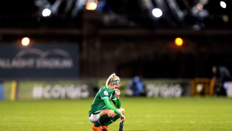 A dejected  Denise O’Sullivan on the pitch at Tallaght Stadium after the defeat to Germany in the  Women’s European Championship qualifier in December 2020. Photograph: Laszlo Geczo/Inpho