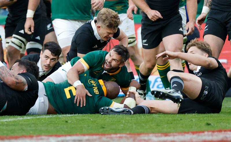 Cobus Reinach celebrates Bongi Mbonambi’s try during South Africa's Rugby Championship match against New Zealand at Ellis Park in Johannesburg. Photograph: Catherine Kotze/Inpho/Photosport    