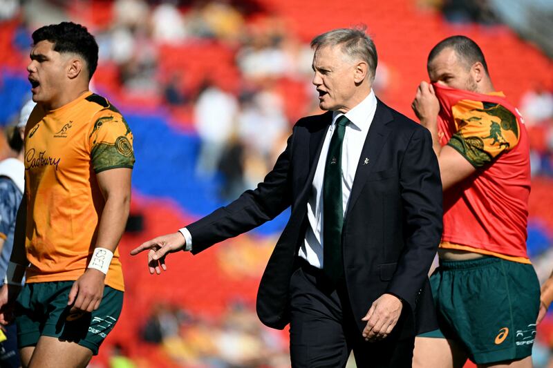 Australia's head coach Joe Schmidt watches as players warm-up before the start of the rugby union Test match between Australia and Fiji in Newcastle. Photograph: Saeed Khan/Getty