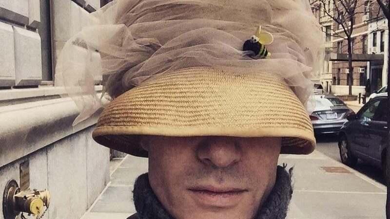 Middle-aged Quentin Fottrell rocking his beehive hat in New York.