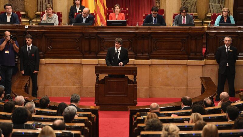 Catalonia president Carles Puigdemont gives his address to the Catalan parliament on Tuesday. Photograph:  David Ramos/Getty Images