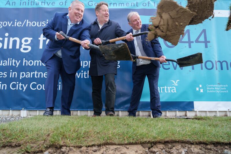 Minister for Housing Darragh O’Brien, centre, turns the sod for part of the O'Devaney Gardens development with Mike Flannery of Bartra Group and Richard Shakespeare of Dublin City Council. Photograph: Barry Cronin