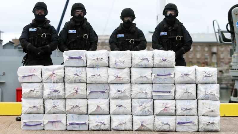 Members of the Irish navy standing behind the haul of cocaine seized from the yacht Makayabella in September 2014. Photograph: PA