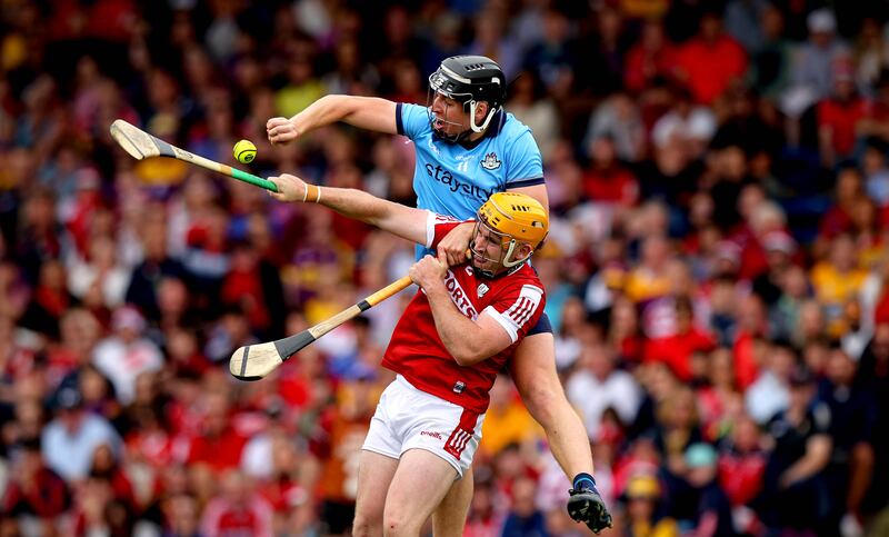Dublin’s Donal Burke and Niall O’Leary of Cork in action during the All-Ireland quarter-final in Thurles. Photograph: Ryan Byrne/Inpho 