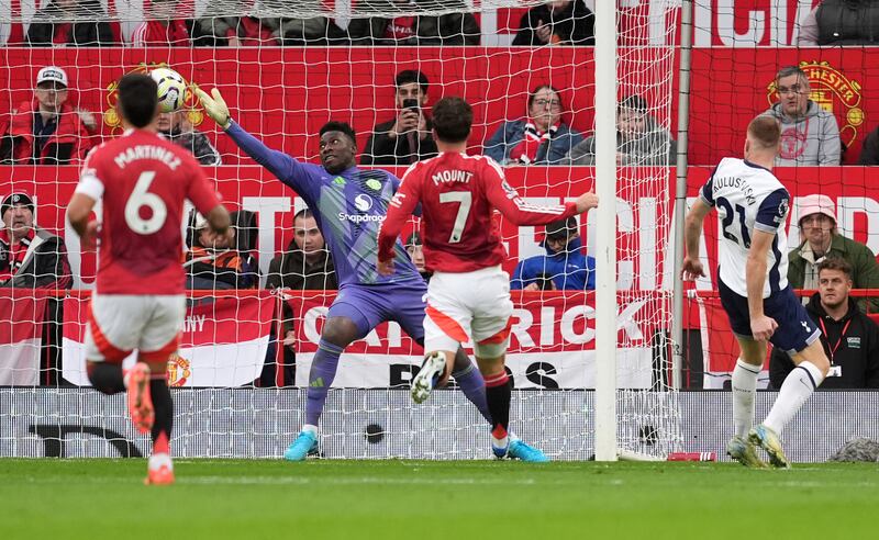 Tottenham Hotspur's Dejan Kulusevski scores his side's second goal against Manchester United, following an error made by Lisandro Martínez. Photograph: Martin Rickett/PA