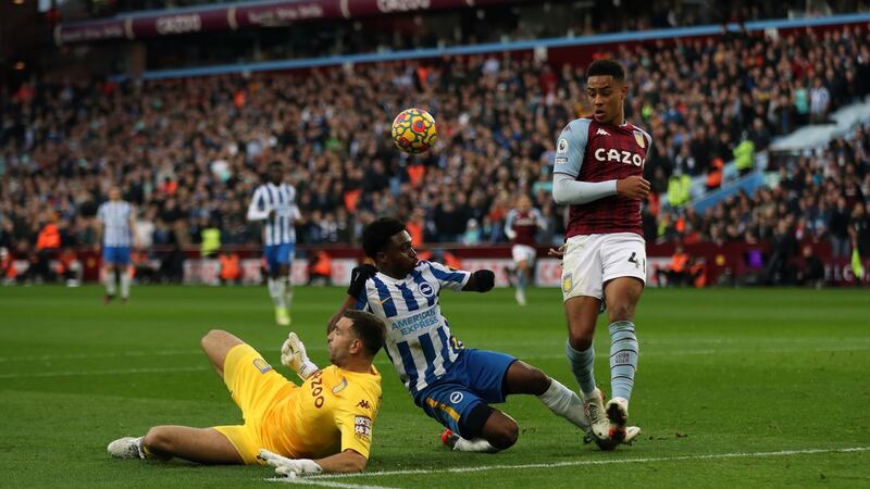 Brighton and Hove Albion’s Tariq Lamptey  competes with Emiliano Martinez and Jacob Ramsey at Villa Park. Photograph: Bradley Collyer/PA