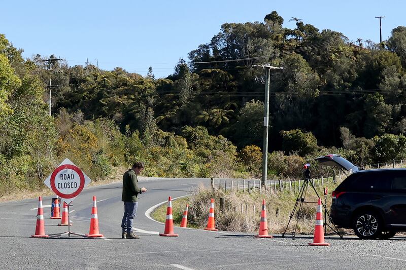 A roadblock close to where a police shootout occurred near the town of Piopio, in New Zealand's Waikato region Photograph: DJ MILLS/AFP via Getty Images          