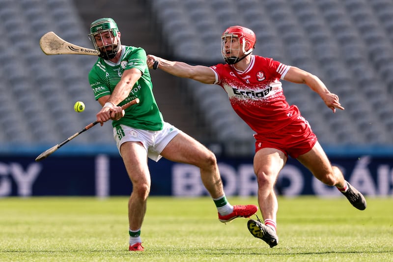 London's Enda Egan with Derry's Patrick Turner. Photograph: Ben Brady/Inpho
