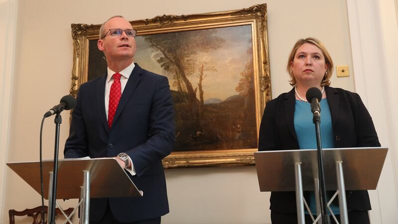 Minister for Foreign Affairs Simon Coveney and Northern Ireland Secretary Karen Bradley during a press conference at Stormont in Belfast. Photograph: Brian Lawless/PA Wire