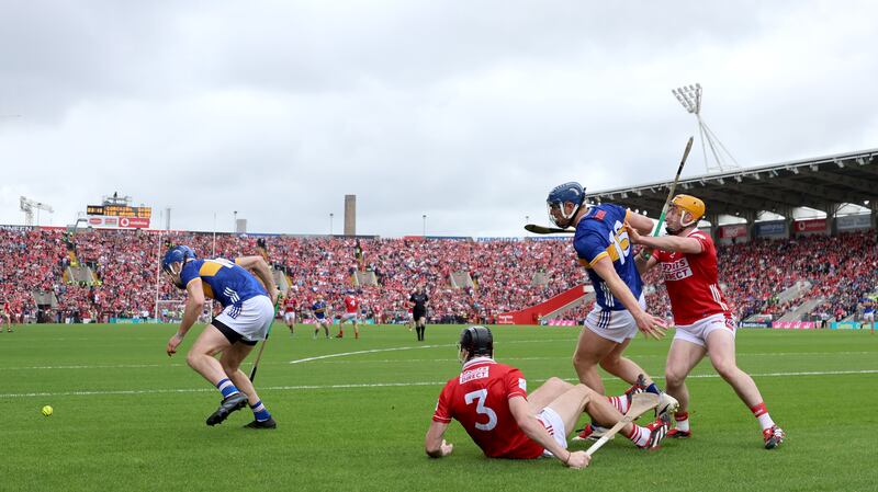 Tipperary’s John McGrath and Jason Forde compete against Eoin Downey and Niall O'Leary of Cork during Sunday's contest at Pairc Ui Chaoimh. Photograph: James Crombie/Inpho