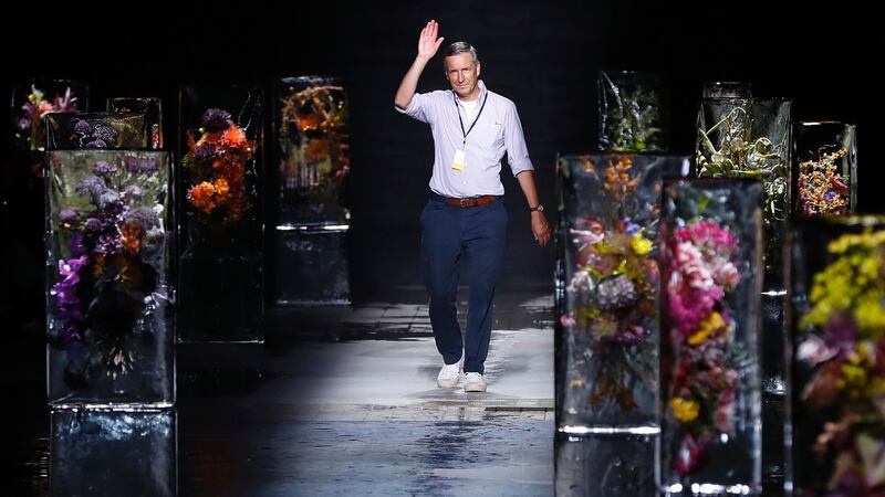 Belgian fashion designer Dries Van Noten acknowledges the audience at the end of his 2017 spring/summer ready-to-wear collection fashion show. Photograph:  Patrick Kovarik/AFP