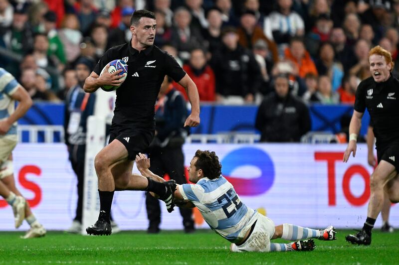 New Zealand’s Will Jordan on his way to scoring his third try  against Argentina at Stade de France. Photograph: Andrew Cornaga/Inpho/Photosport